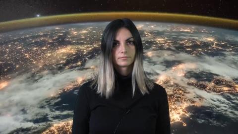 Valentina Karga with planetary background